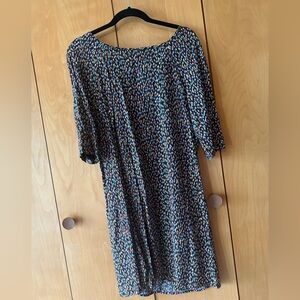 Promod Cute little multi-colored dress fully lined with a tie at the back. NWT